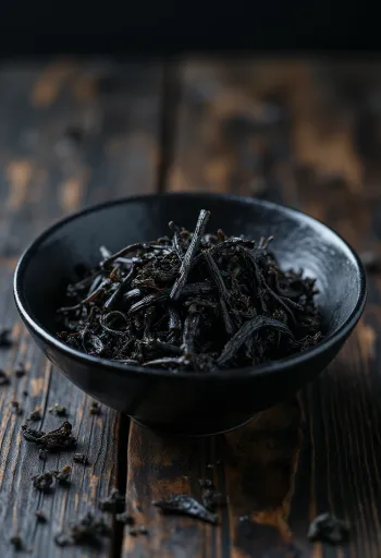 Dried Hijiki seaweed strands, black and textured.