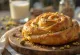 Pistachio Kanelbullar baked golden brown with crunchy nuts on top