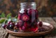 Pickled plums in a glass jar