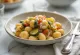Baked vegetable gnocchi served in a bowl