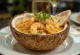 Daab Chingri prawns with garam masala, served with coconut milk and fresh coriander