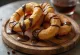 Fried cakwe dough sticks served with chocolate sauce