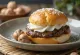 Hazelnut cream Semla, served with fluffy filling and dusted with icing sugar