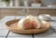 Rosewater and marzipan bao bun served