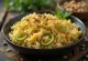 Prebiotic spiced leek rice served with fresh coriander