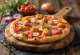 Pizza al Pollo with roasted chicken breast and fresh herbs