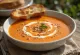 Creamy red pepper soup served