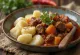 Hungarian beef stew served with potatoes