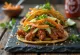 Fusion taco with teriyaki chicken, pickled vegetables and spicy mayonnaise