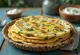 Lauki thepla, served with fresh coriander
