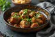 Sarapatel with pork heart, rich spicy meat dish garnished with fresh coriander