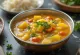 Rasam with raw mango, served with rich spices