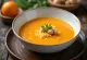 Carrot and ginger soup served in a bowl