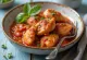 Chicken cacciatore with tomato sauce, served with peppers and black olives