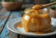 Dulce de leche with milk, silky caramel in a bowl