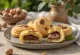 Melomakarona biscuits filled with Nutella, soaked in honey syrup