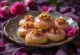 Melomakarona soaked in rosewater syrup, served