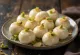 Malai Sondesh with cream, garnished with fresh cottage cheese and rosewater