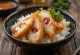 Katsudon stuffed with umeboshi pickled plum served, mouth-watering golden brown meats.