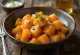 Boiled sweet potato with garlic served with fresh parsley
