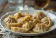 Smoked meat pelmeni served with sour cream