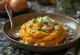Quibebe with cheese served, garnished with fresh coriander