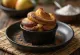 Cinnamon and apple chocolate soufflé served