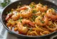 Fideuà amb Gambes, served with prawns and rich tomato sauce, Spanish dish
