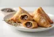 Chocolate samosa, fried golden brown with filling inside