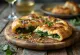 Spinach calzone stuffed pizza