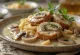 Pork tenderloin in mushroom sauce, served with fresh parsley