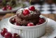 Glacé cherry and chocolate soufflé served