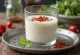 Spicy kefir served in a glass, sprinkled with paprika and pepper on top