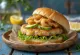 Squid burger served with fresh vegetables