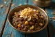 Kovil Sakkarai Pongal served with fresh herbs