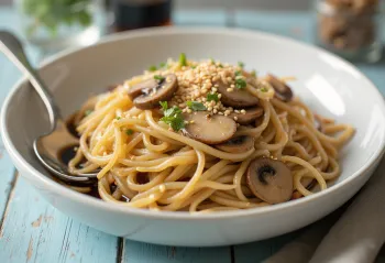 Pastel Tutup served with mushrooms and glass noodles, sprinkled with sesame seeds