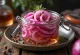 Sweet and sour red onions served