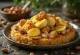 Chicken Maqluba – layered rice, fried vegetables and chicken served turned out, Eastern style