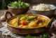 Spicy Sambar served with fresh coriander