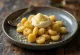 Served sweet gnocchi with wine sabayon
