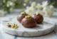 Chocolate Sandesh, sweet Indian dessert, decorated with chocolate and pistachios