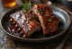 Smoked BBQ pork ribs rack on board