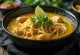 Khao soi soup served
