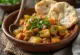 Shurpa with vegetables, rich and spicy soup with vegetables and chicken meat
