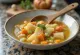 Probiotic vegetable soup served with kefir, colourful vegetables